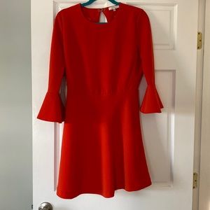 Revolve Women’s open back bell sleeve red/orange dress